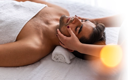 A patient receiving a face massage.