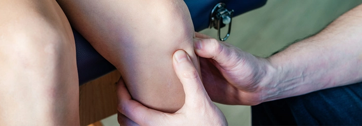 Trigger Point Therapy on a patients knee.