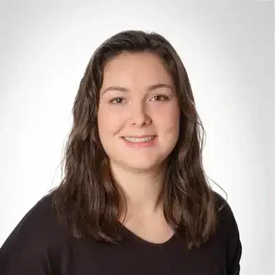 Jenna Cliffe smiling in a black shirt.